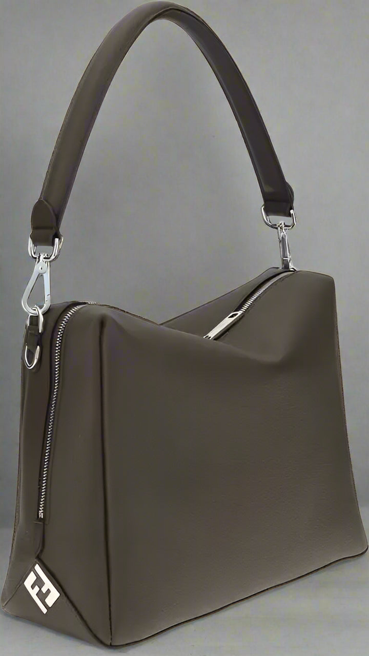 Dark brown handbag with a visible brand logo on a white background