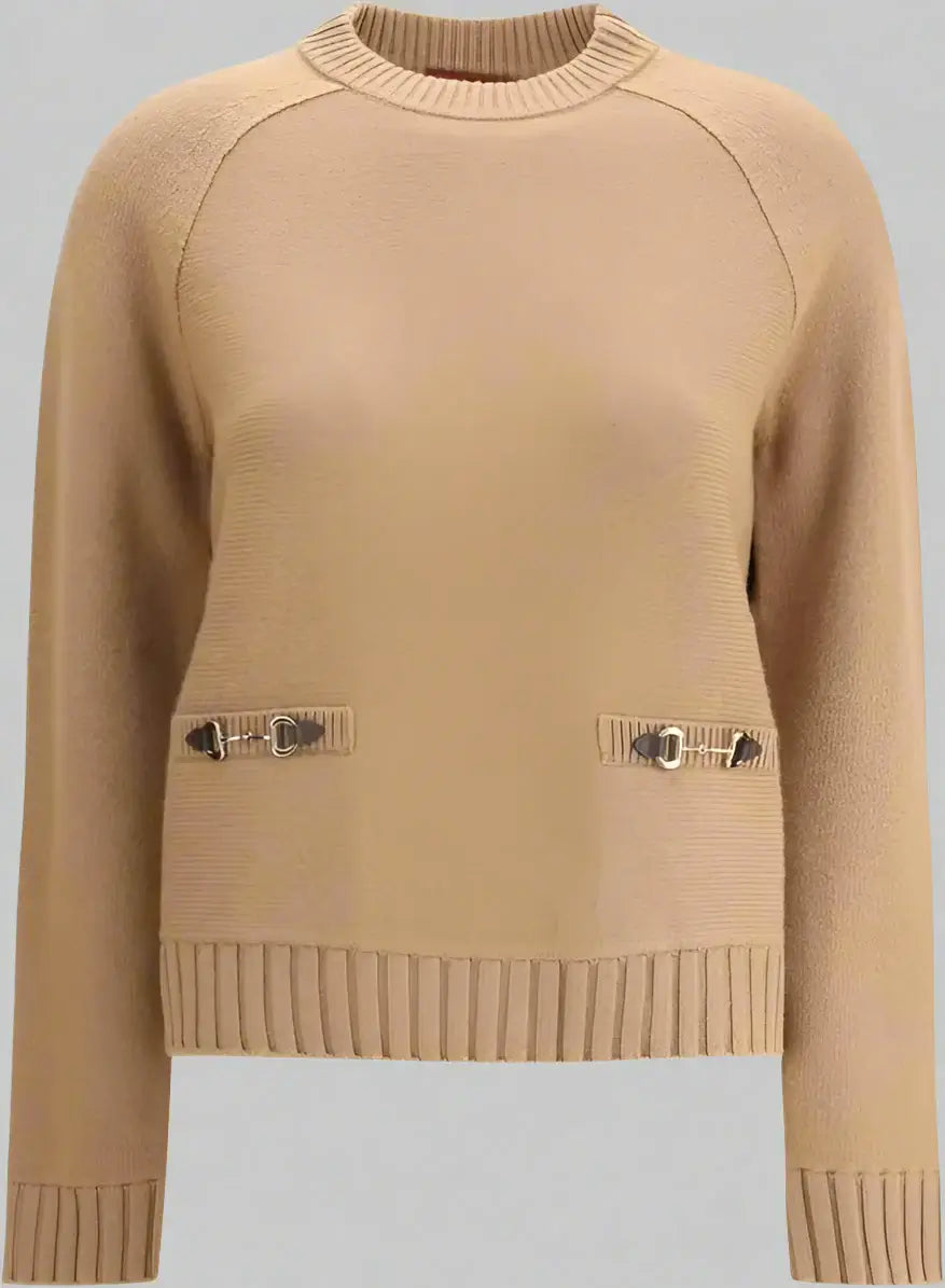 Beige sweater with button details on a white background