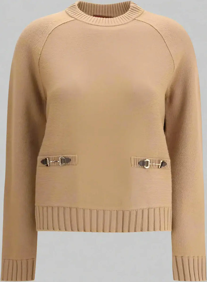 Beige sweater with button details on a white background