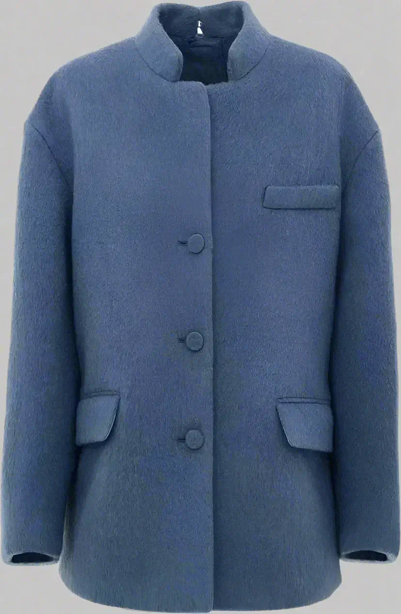 Blue coat with button details on a white background