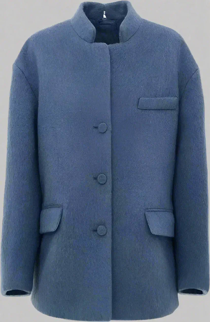 Blue coat with button details on a white background