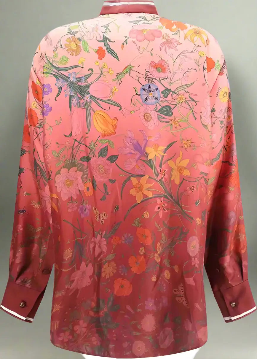 Floral patterned shirt with a mix of colors on a white background