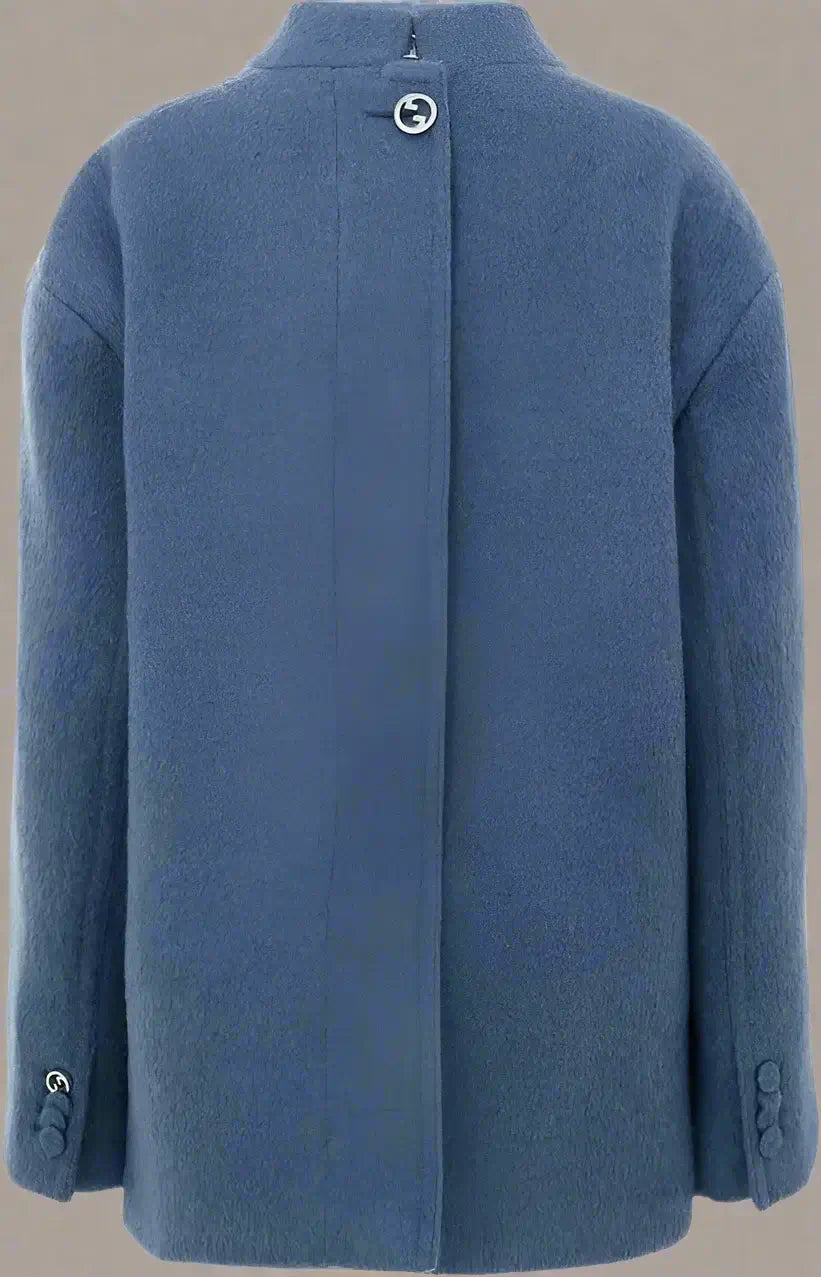Blue coat with buttons on a white background