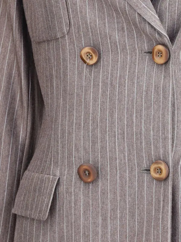 Close-up of a gray pinstripe coat with wooden buttons