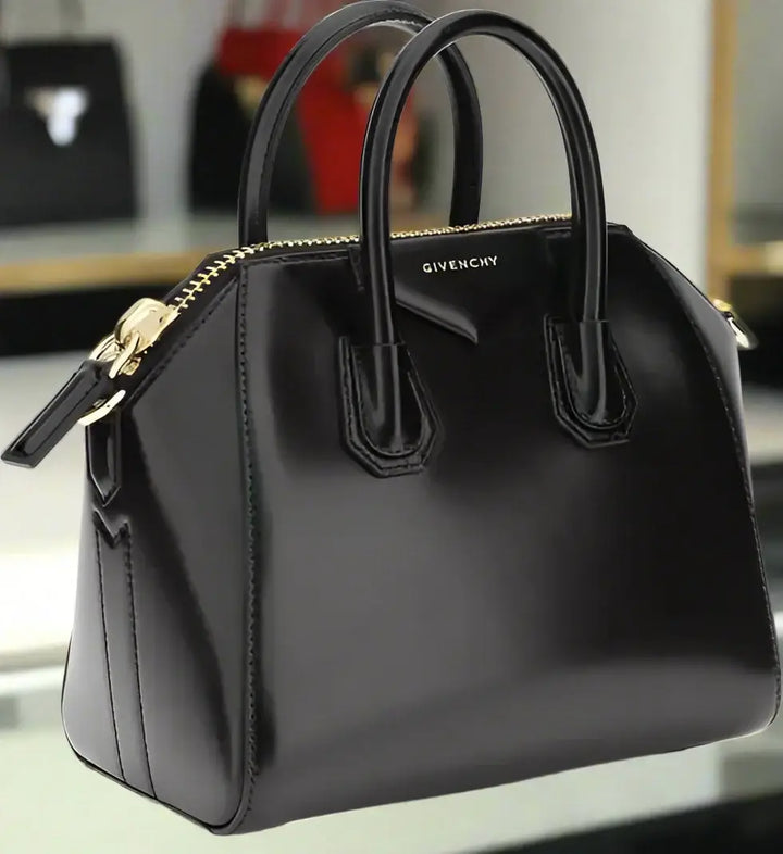 Black Givenchy handbag on a white background