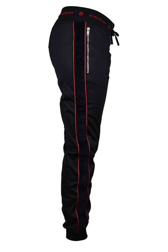 Black pants with red accents and a visible brand logo on a white background