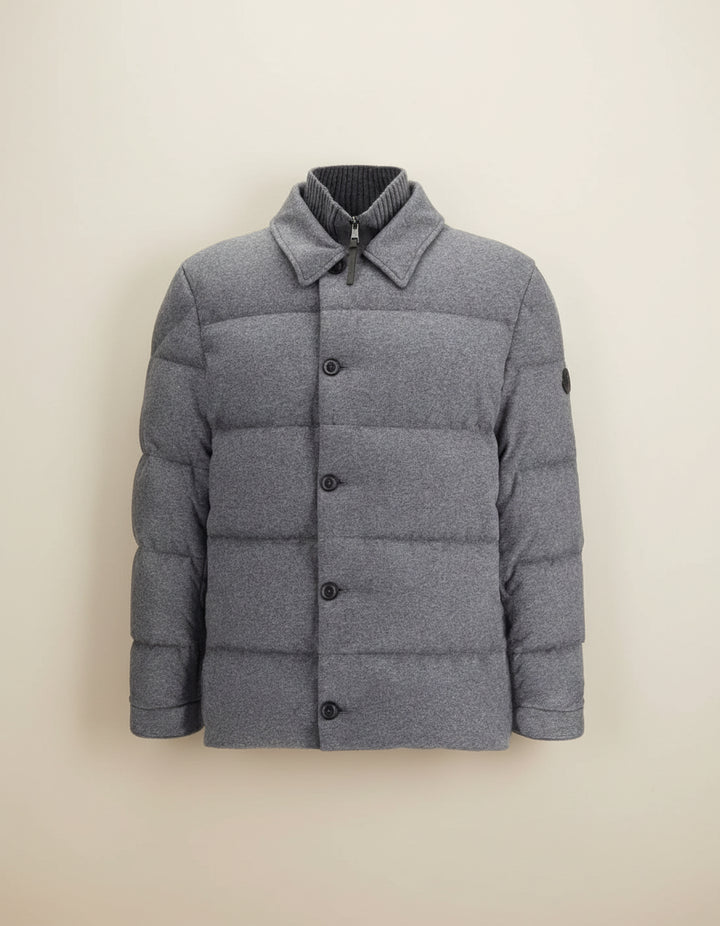Gray puffer jacket with button details on a white background