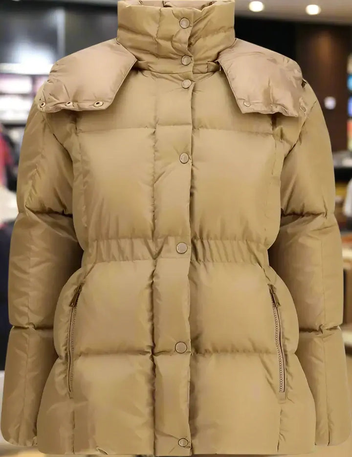 Beige puffer jacket with a fur-lined hood on a white background