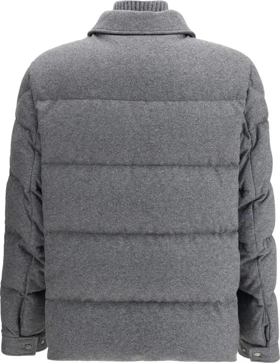 Gray puffer jacket on a white background