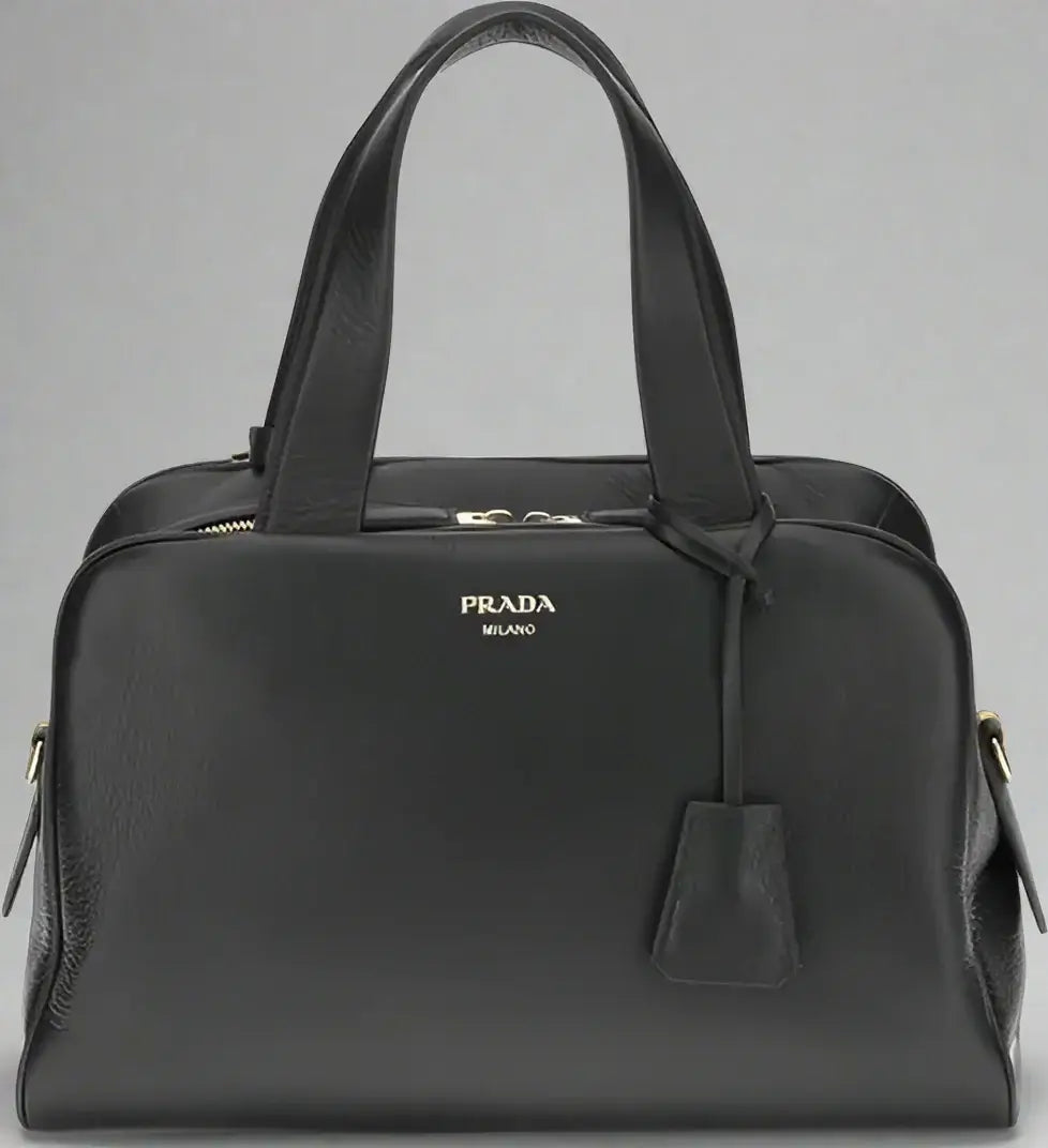Black Prada handbag on a white background