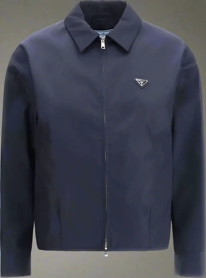Navy blue jacket with a brand logo on a white background