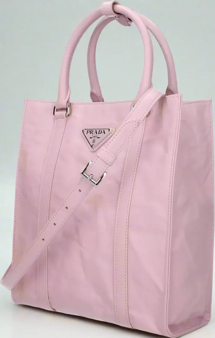 Pink Prada tote bag on a white background
