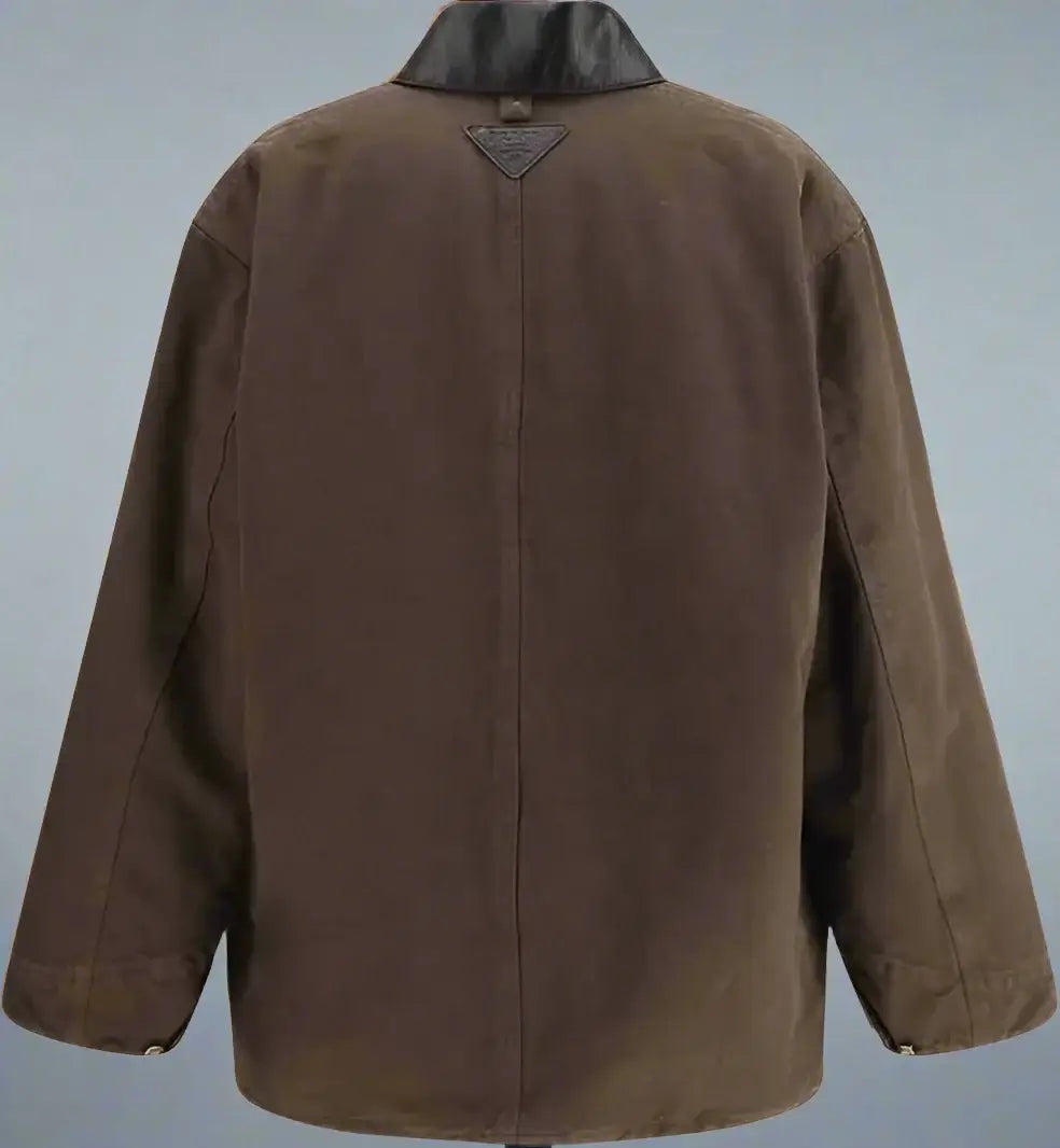 Brown jacket with black collar on a white background