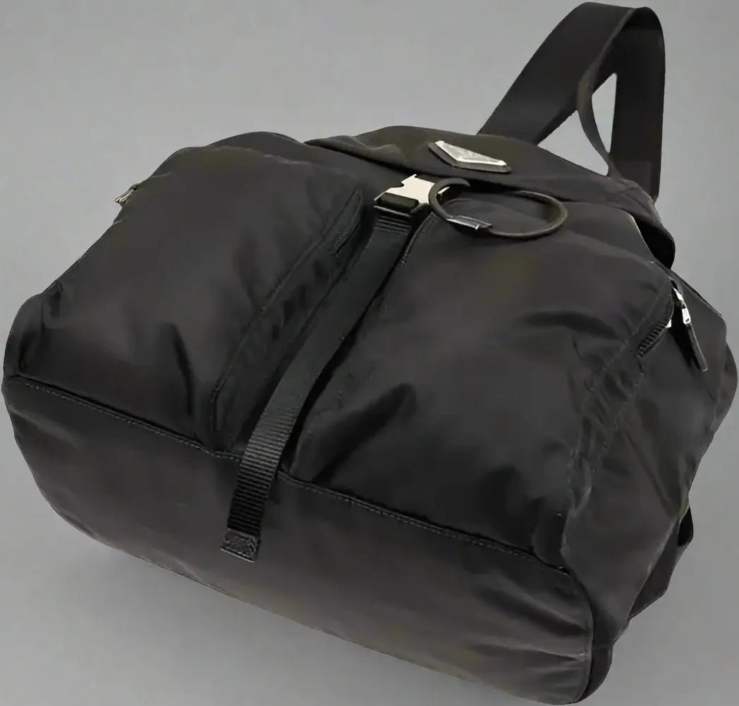 Black backpack on a white background