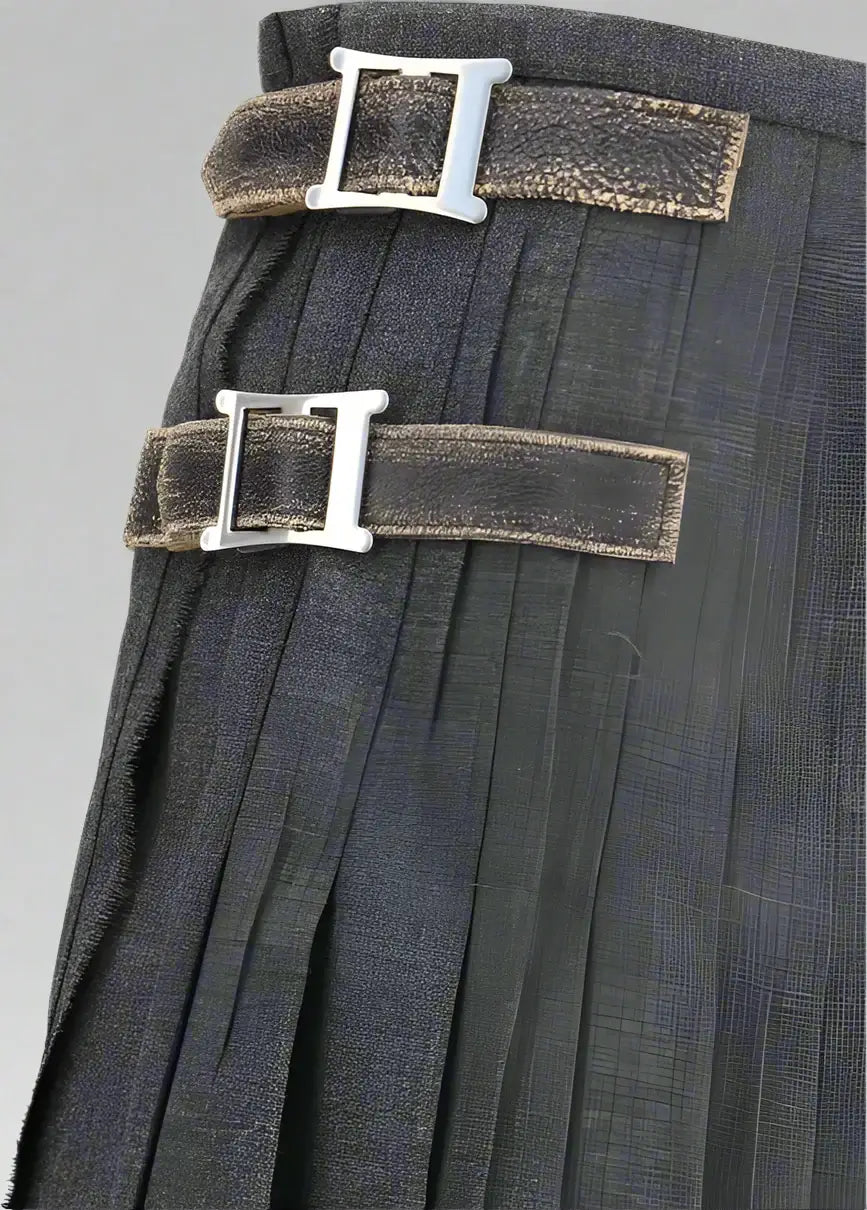 Gray pleated skirt with brown belt and silver buckle on a white background