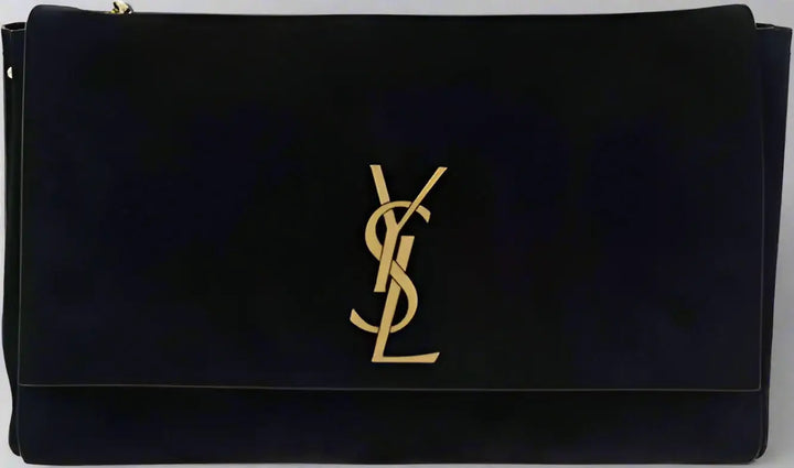 Black clutch bag with gold logo on a black background
