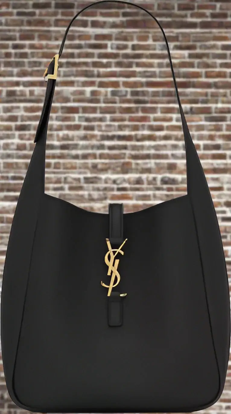Black handbag with a gold logo on a white background