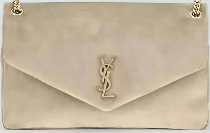 Beige handbag with a gold logo on a beige background