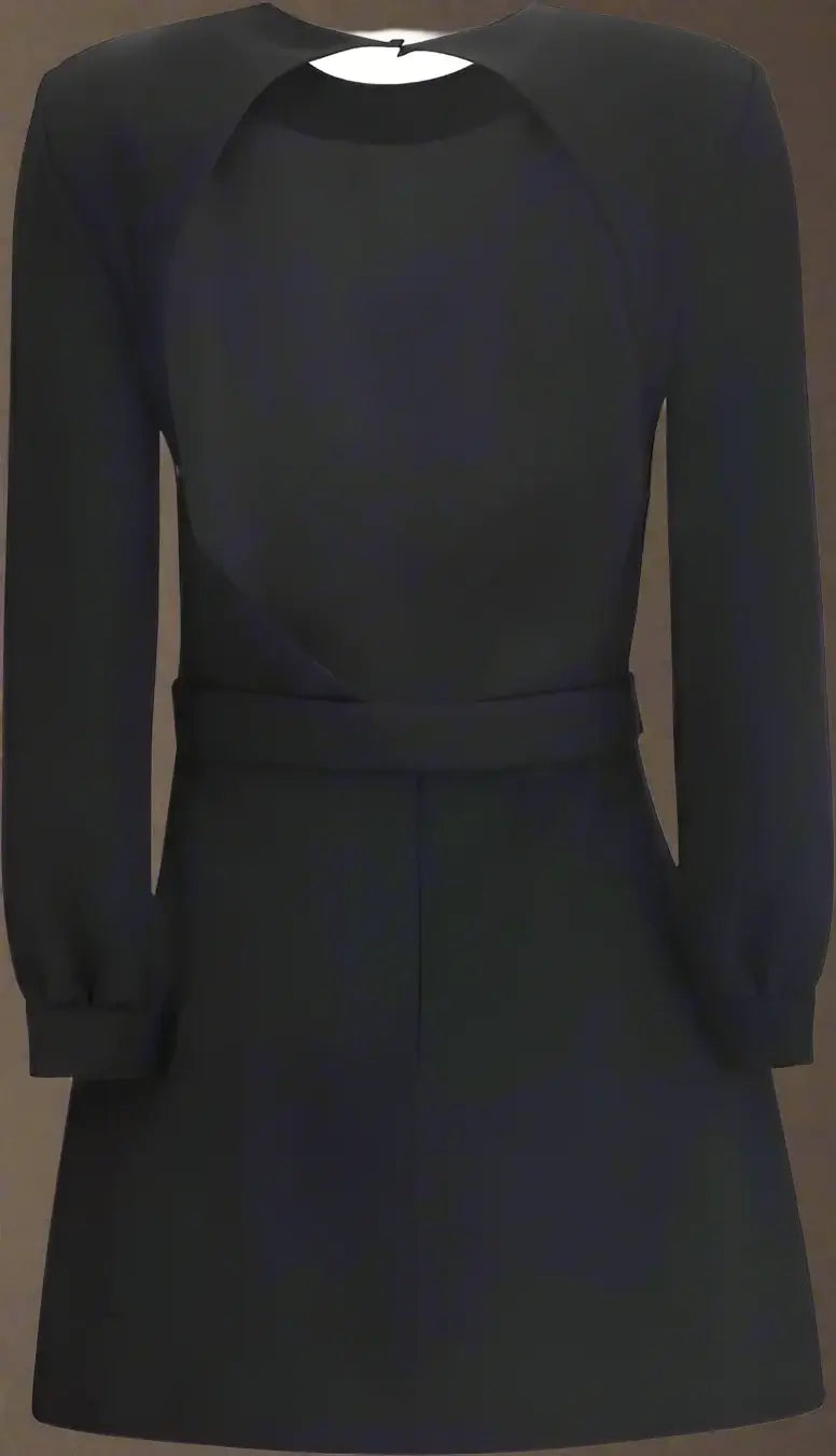 Black dress with long sleeves on a plain background