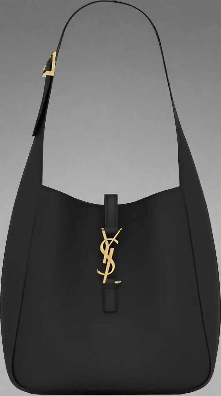 Black handbag with gold logo on a white background