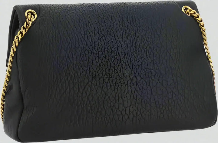 Black textured handbag with gold chain strap on a white background