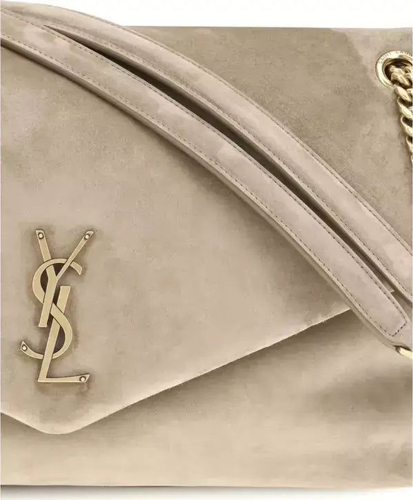 Beige handbag with a gold logo on a light gray background