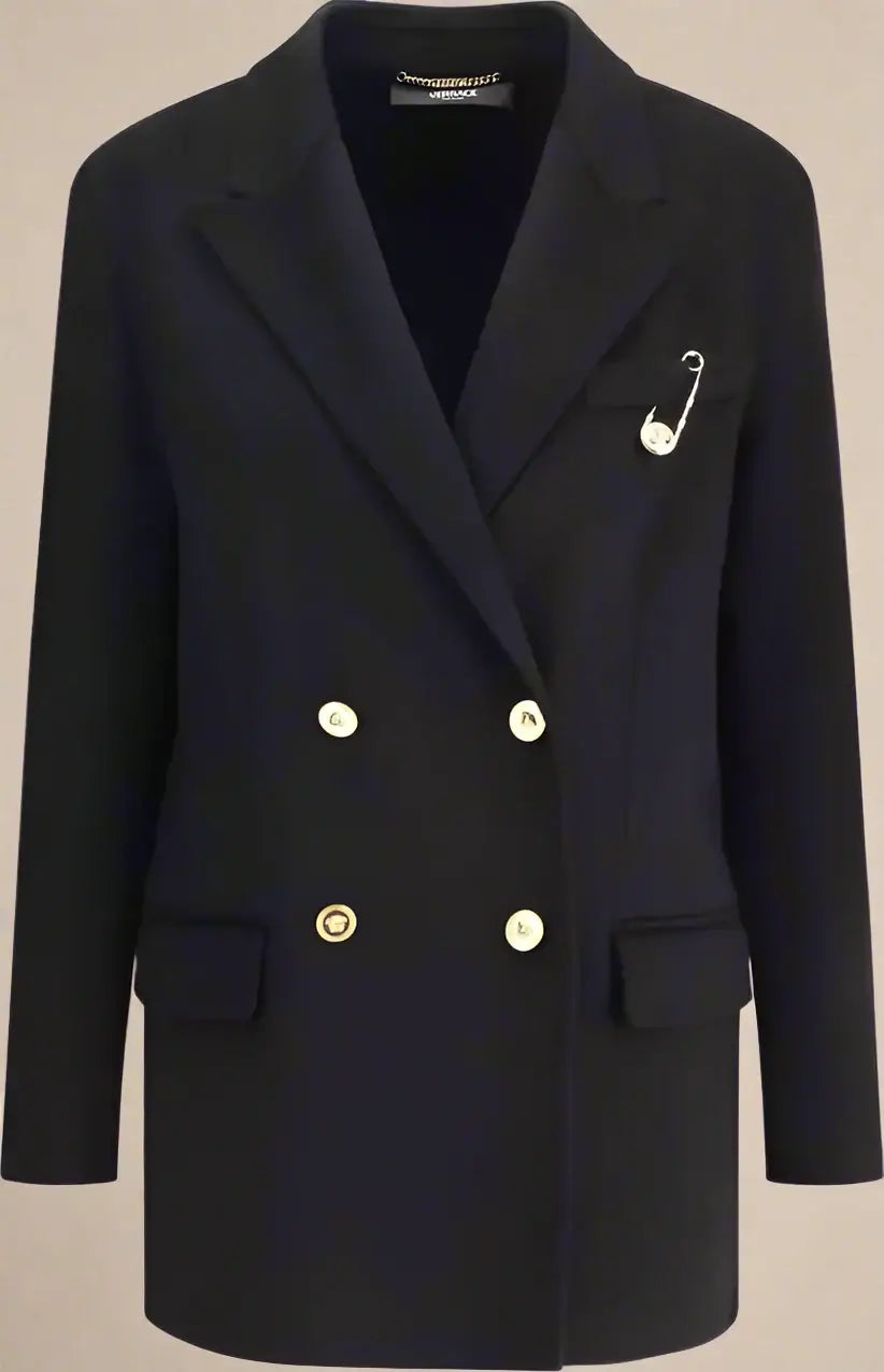 Black blazer with gold buttons and a brooch on a white background