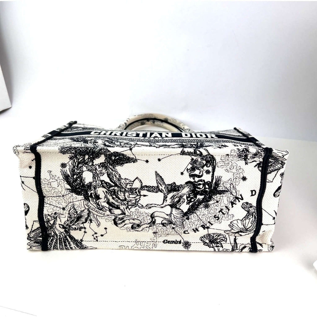 Christian Dior Book Embroidered Canvas Medium Stars and Signs Black Tote showcasing detailed embroidery and luxury design.