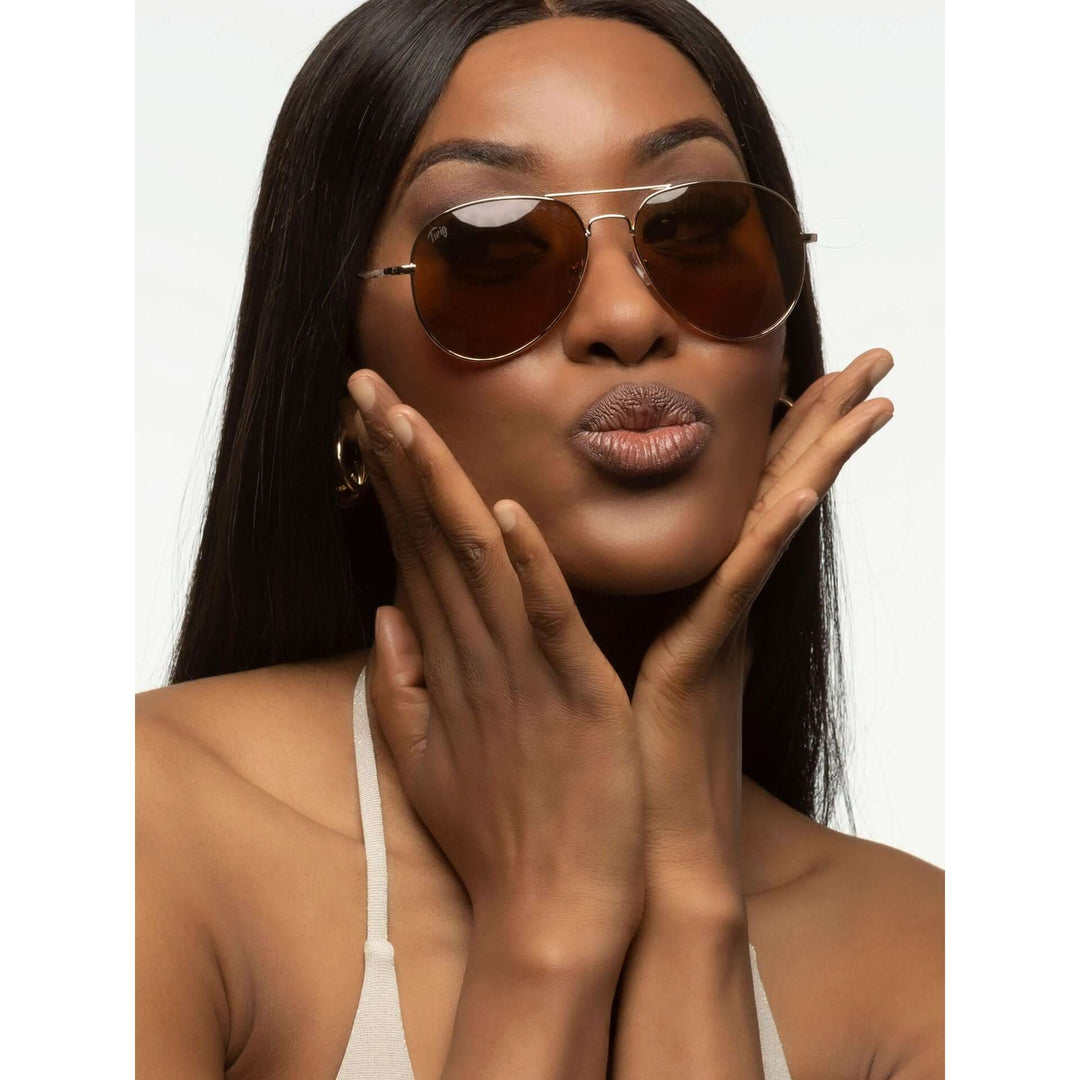Twig men's and women's sunglasses in assorted styles including aviator, round, and square frames