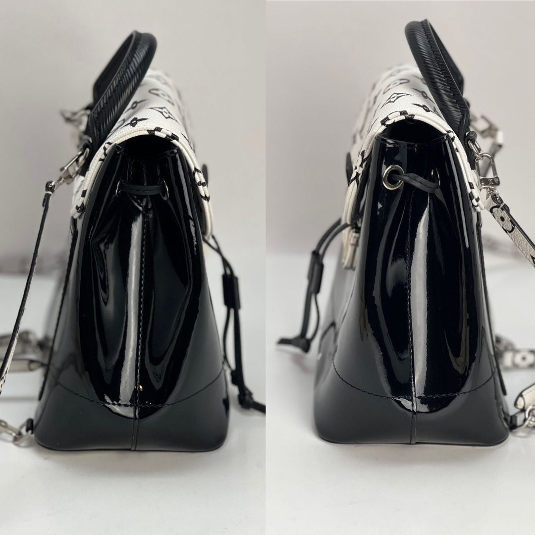 LOUIS VUITTON Hot Springs Backpack White Monogram and Patent Leather side view showcasing luxury bags design.