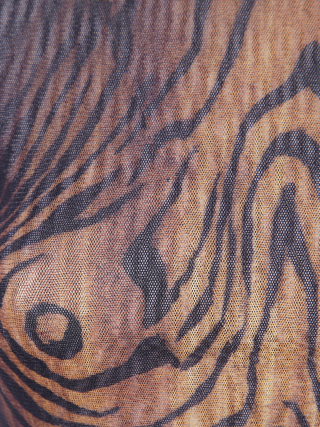 Close-up of fabric with tiger stripe pattern