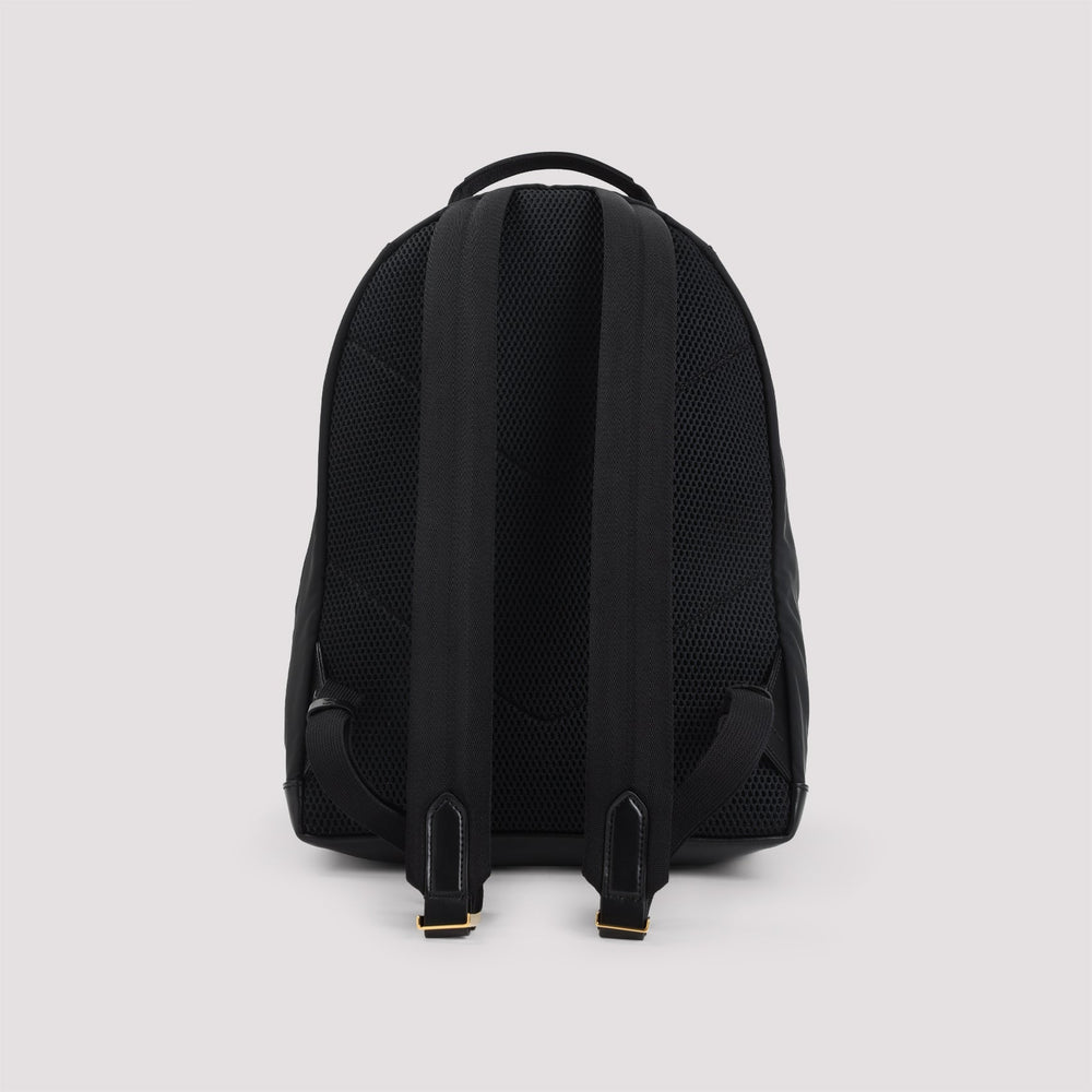 Black backpack on a light gray background