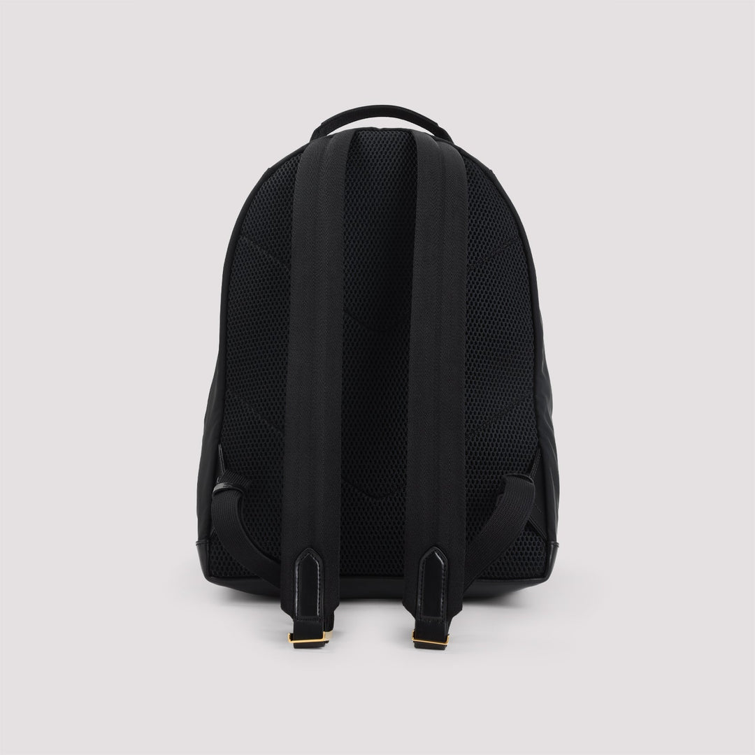 Black backpack on a light gray background