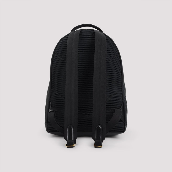 Black backpack on a light gray background