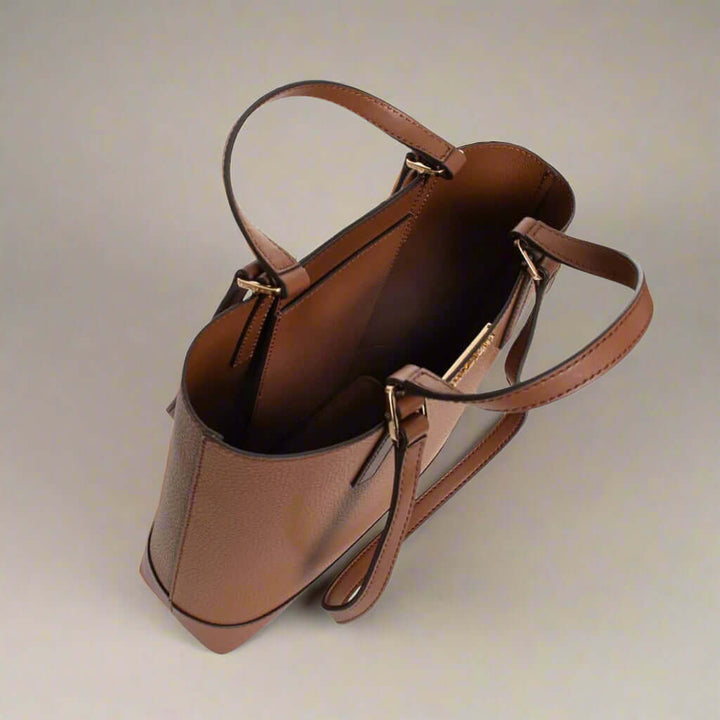 Brown leather handbag with gold hardware on a white background