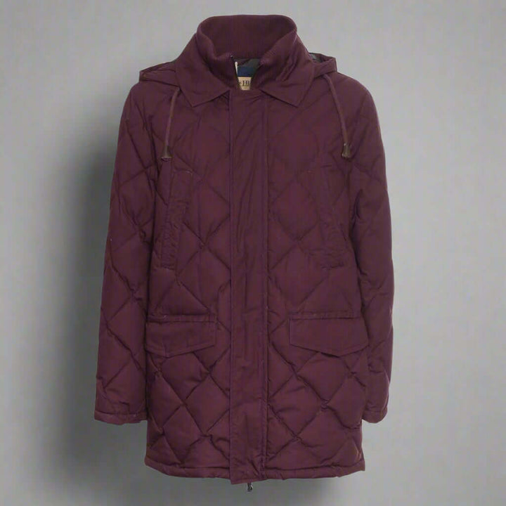 Maroon quilted jacket on a white background