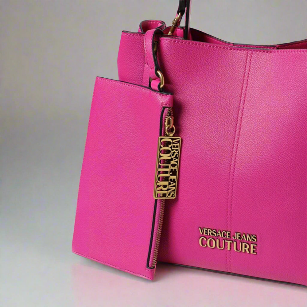 Versace Jeans Couture pink shopping bag with gold emblem and removable pochette, stylish synthetic leather handbag.