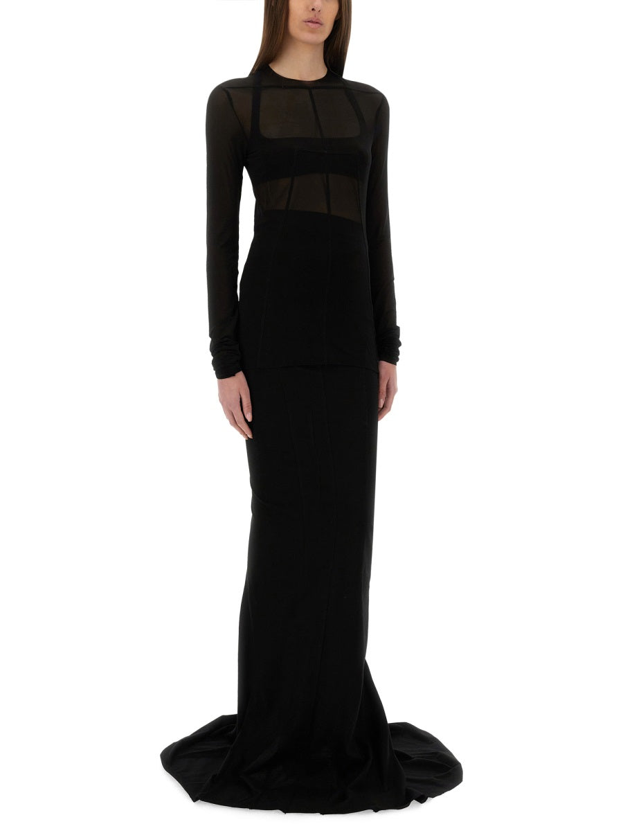 Black evening gown with sheer long sleeves on a white background