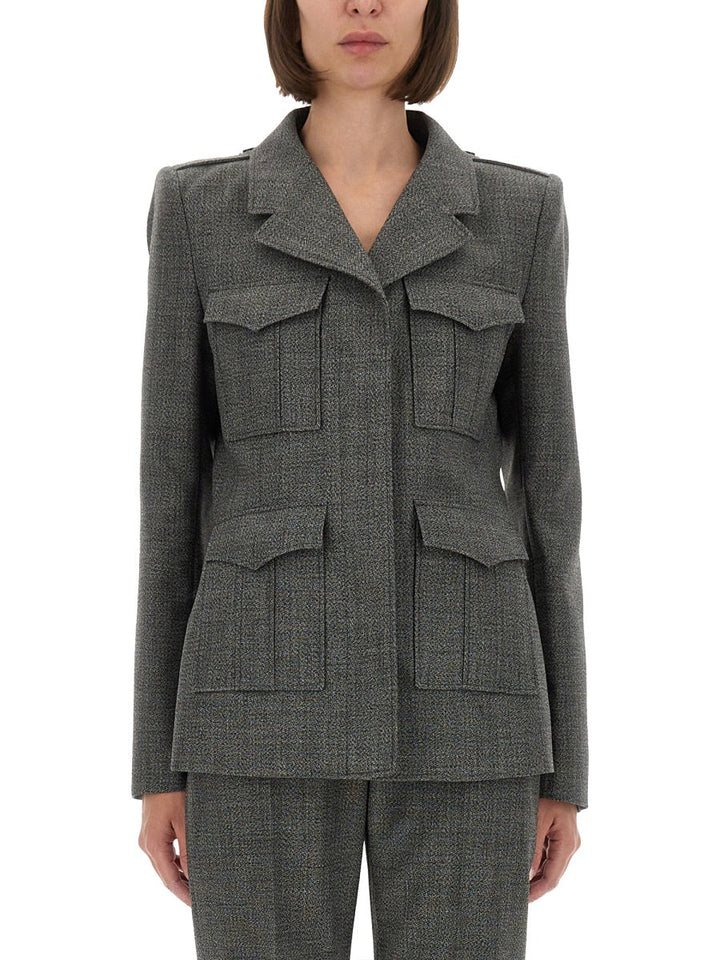 Gray suit with multiple pockets on a white background