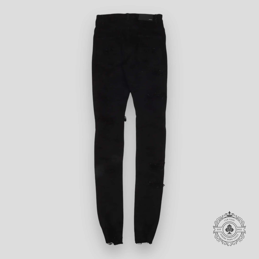 Amiri Distressed Denim Jeans in Black