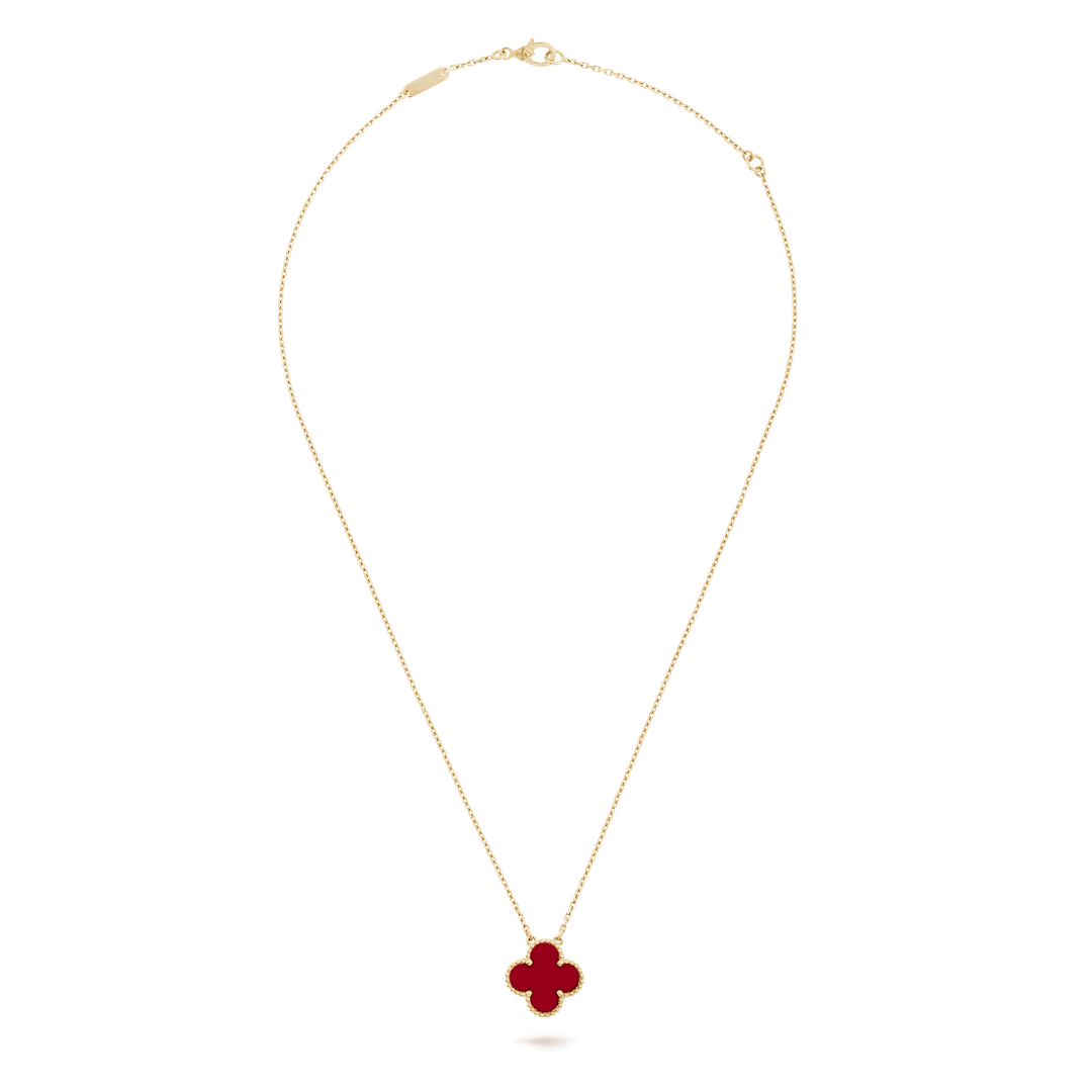 Van Cleef & Arpels Vintage Alhambra pendant 18K yellow gold, Carnelian on a delicate chain.
