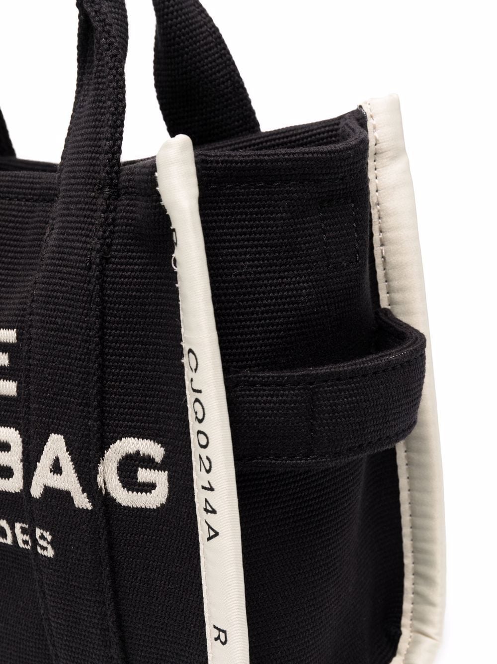 Black bag with white text and a strap on a white background