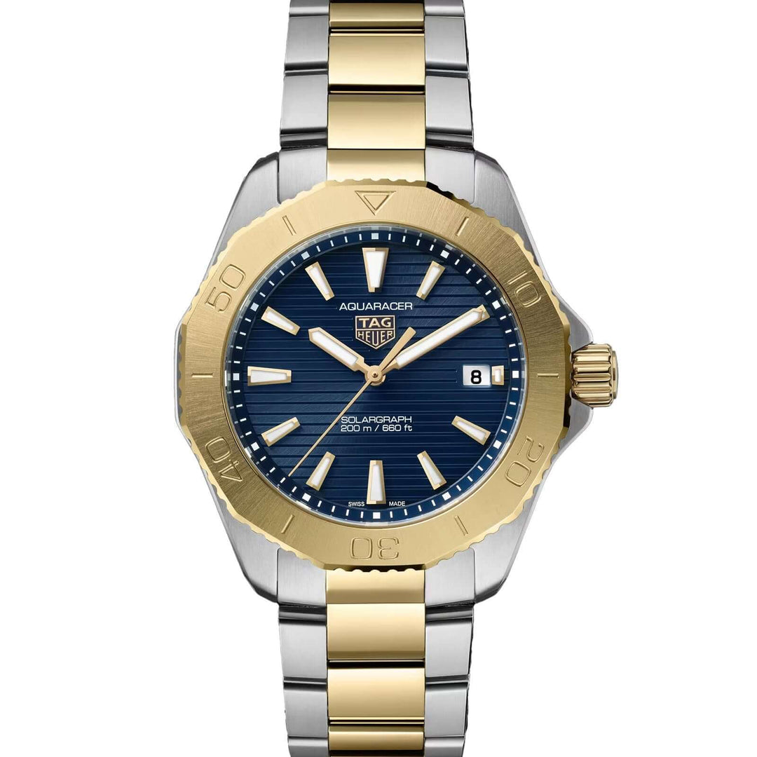 Two-tone gold and silver watch with blue dial on a white background