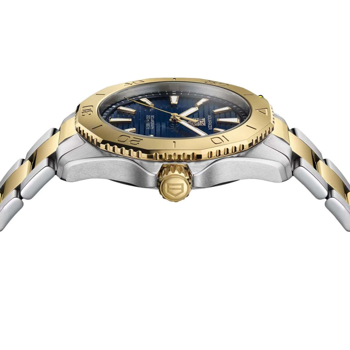 Two-tone watch with gold and silver band on a white background
