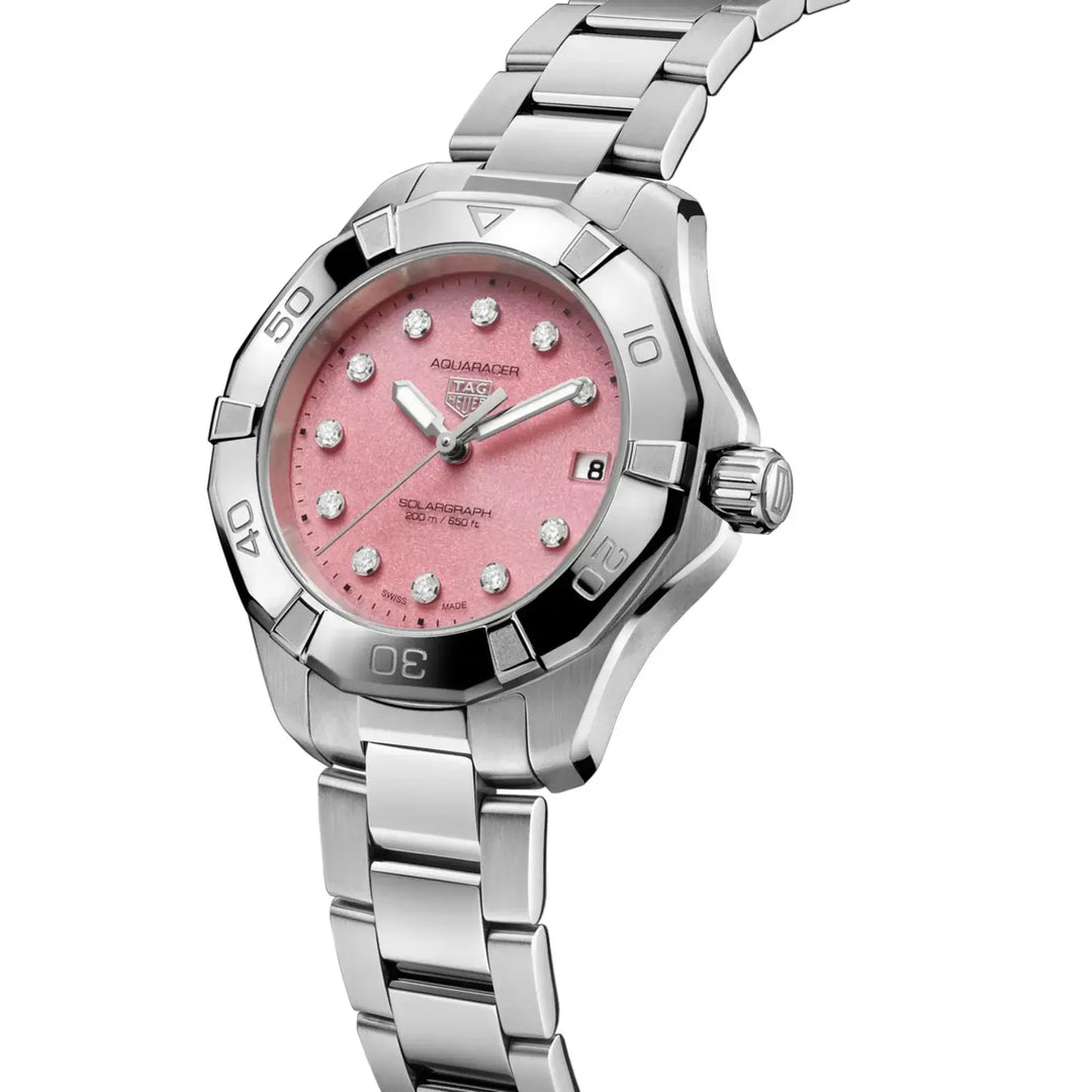 Silver watch with a pink face on a white background