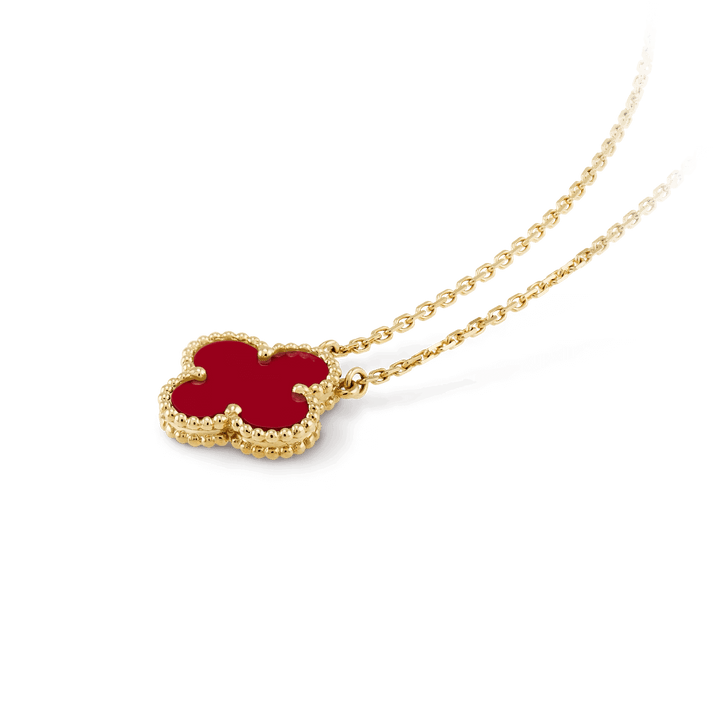 Van Cleef & Arpels Vintage Alhambra pendant 18K yellow gold, Carnelian fine jewelry pendant on a chain.