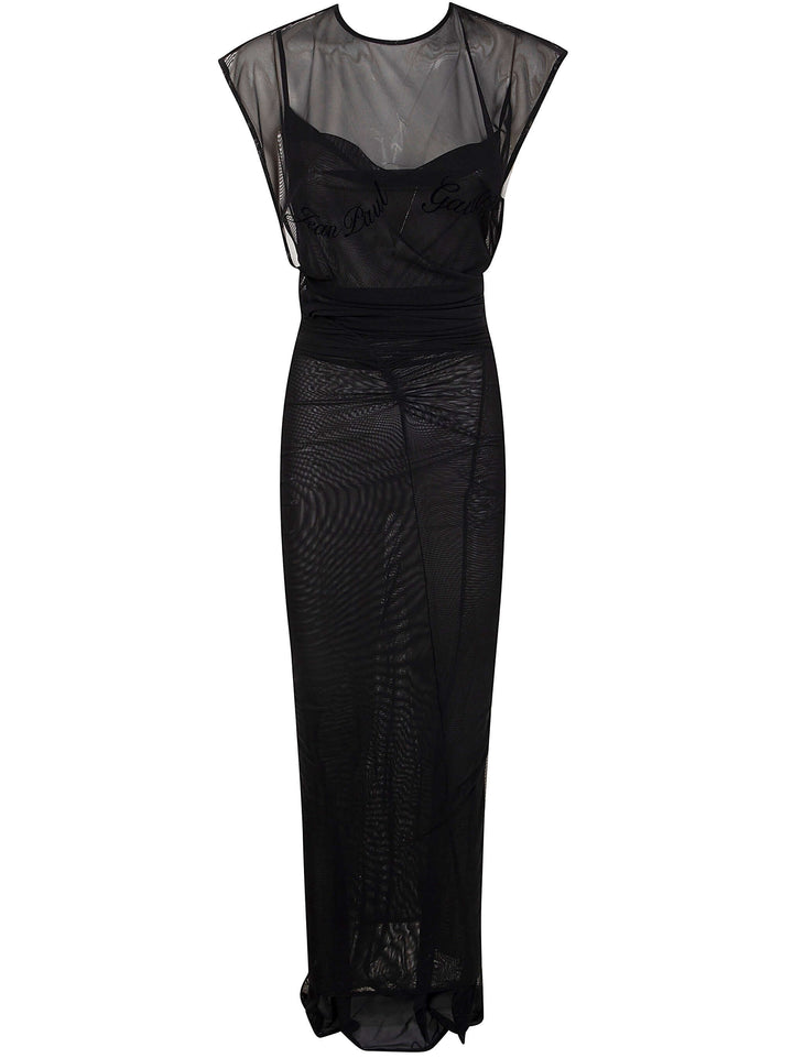Black evening gown with sheer sleeves on a white background