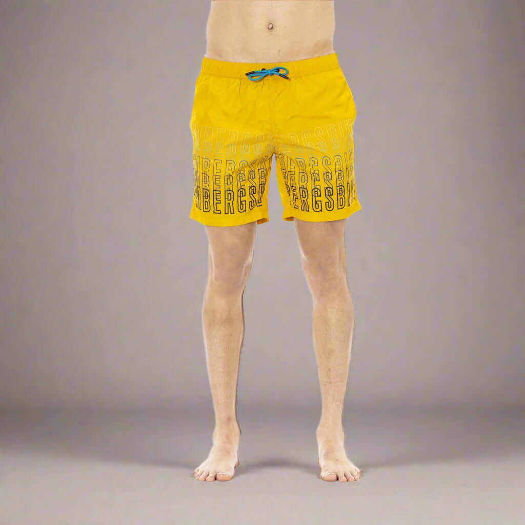 Men’s Bikkembergs beachwear and swimwear collection at STORE 7994 featuring modern swim trunks and sporty beach styles for summer.