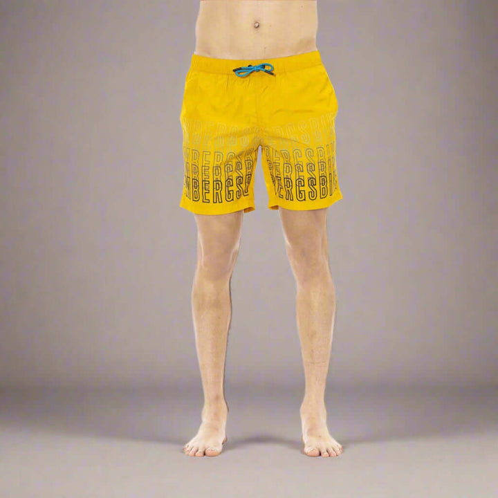Men’s Bikkembergs beachwear and swimwear collection at STORE 7994 featuring modern swim trunks and sporty beach styles for summer.