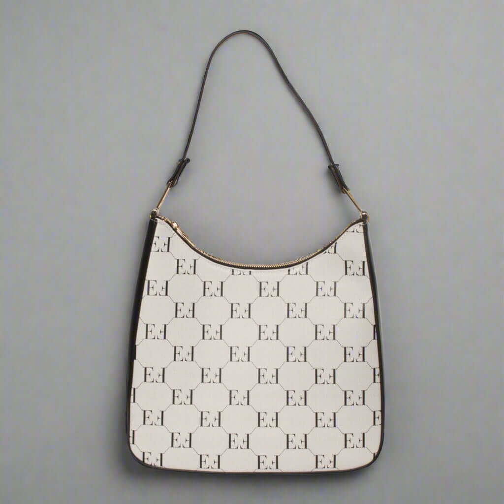 Handbag with a patterned design on a white background